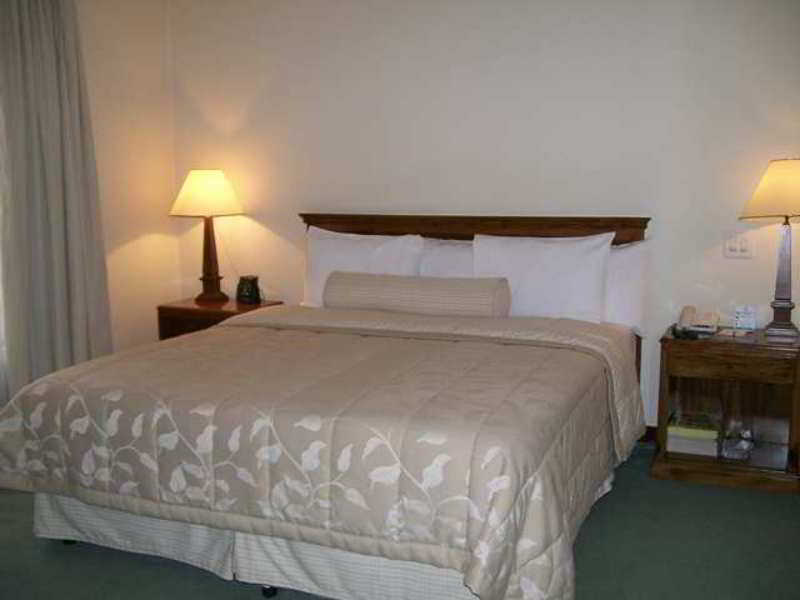 Embassy Suites by Hilton Bogotá - Rosales Quarto foto A bedroom at the hotel